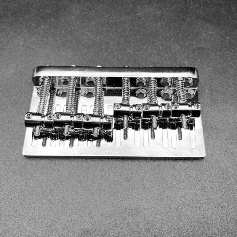 

Zinc Alloy 6-String Bass Bridge 102.5x54MM Fixed Bass 16x5MM Bridge Bottom Through String Heavy Loaded Chrome