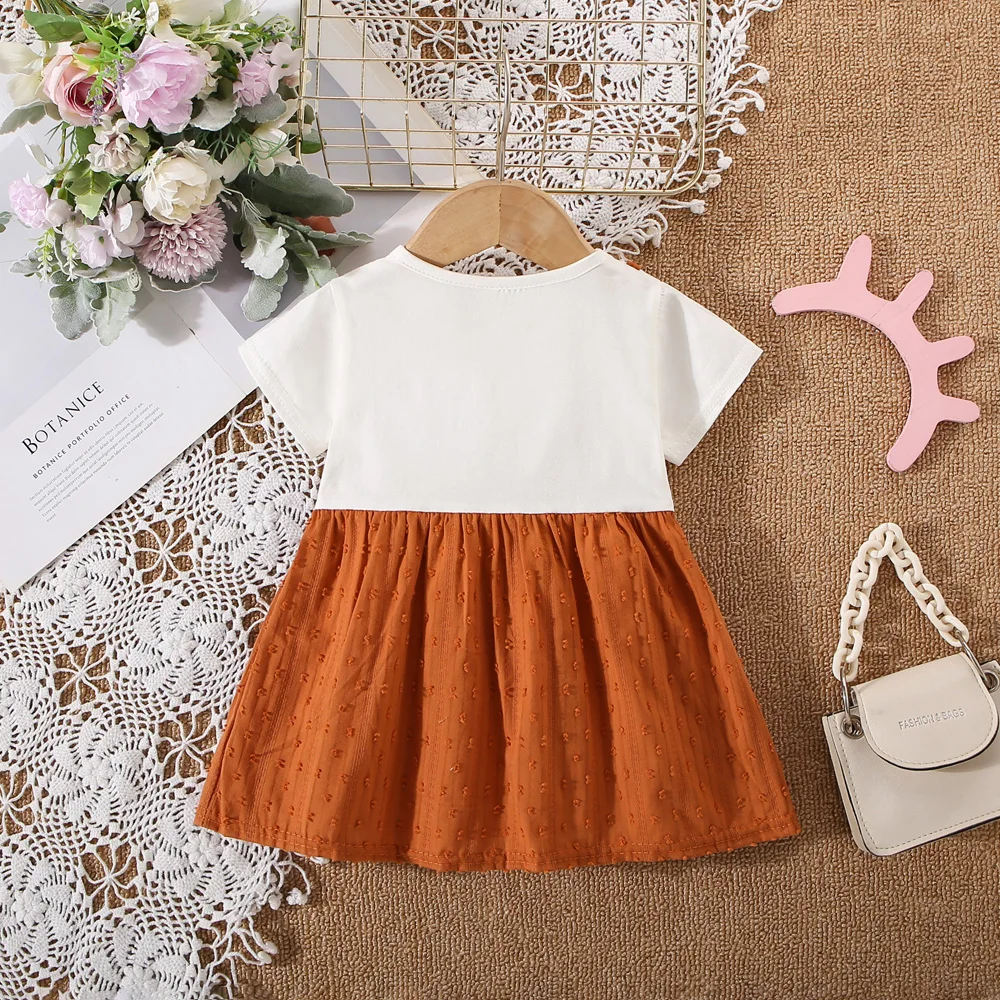 Summer baby girl dress baby girl fake two pieces of pure white short sleeved two small bow strap dress