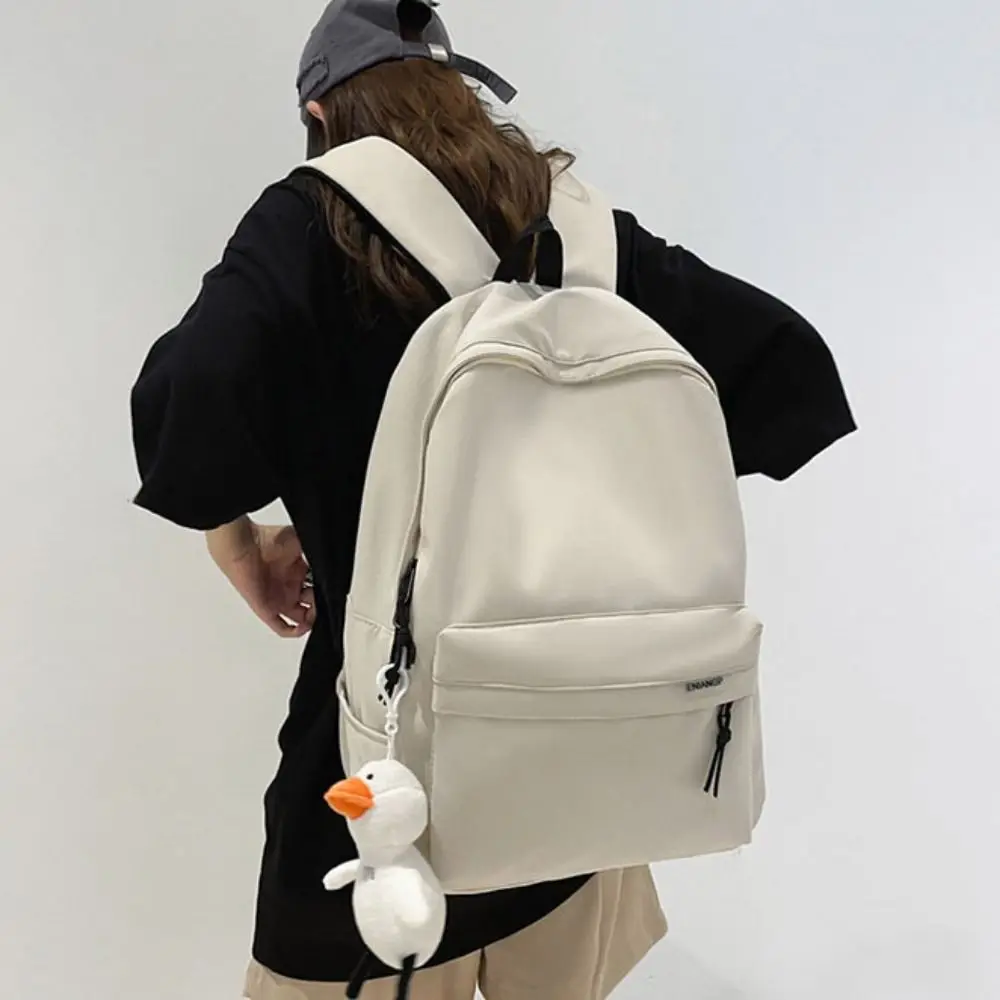 

Large Capacity Backpack Casual Look Japanese Style Students Schoolbag with Pendant Multiple Pockets Teenage Nylon Book Bag