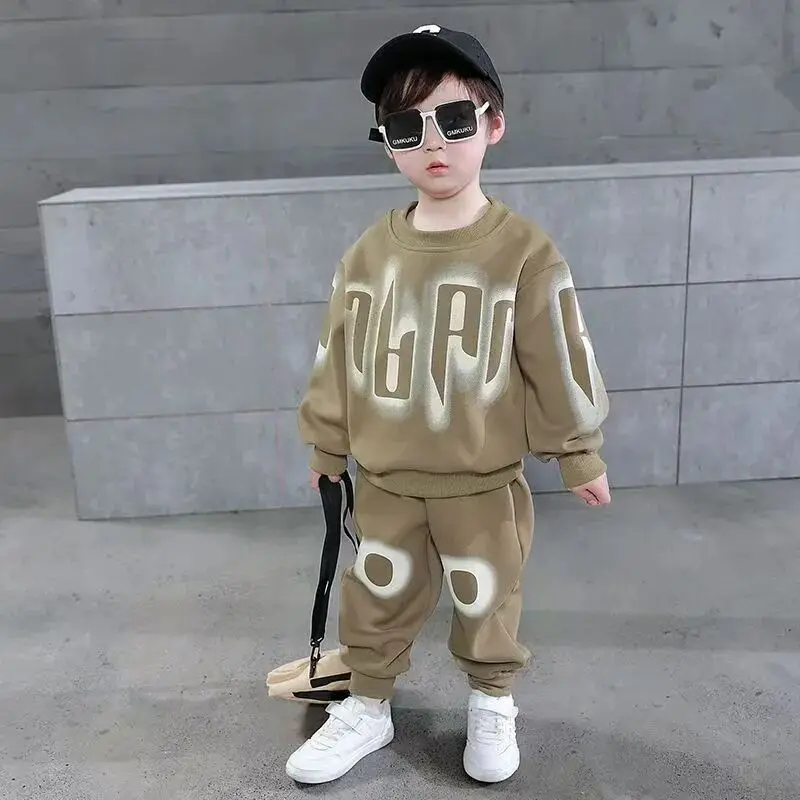 Wiosenny i jesienny zestaw odzieży dziecięcej 2025 Nowy luźny zestaw sportowy dla chłopców i dziewcząt Spodnie z kapturem Dwuczęściowy zestaw