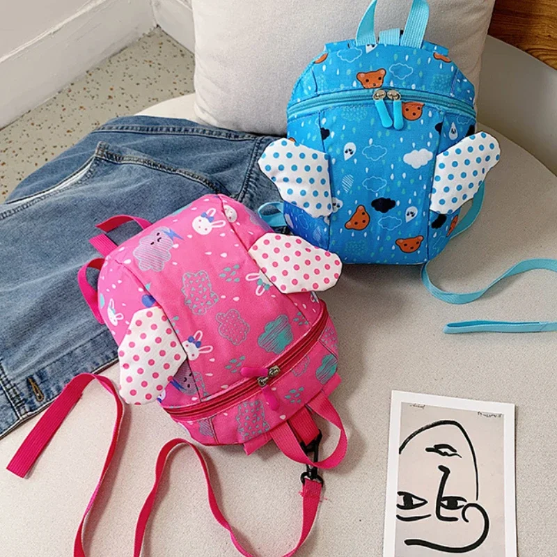 

Fashion Backpack Cartoon Large Capacity School Bag Travel Kindergarten Kid Anti Lost Backpack Traction Rope Angel Wing Backpack
