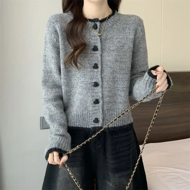 Camisola feminina casaco 2025 outono inverno novo design cor bloco coração botão malha cardigan manga curta topo