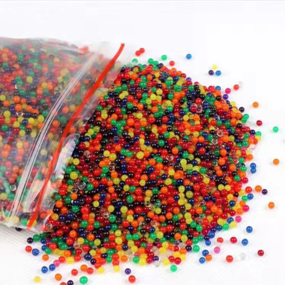 6000 개/가방 물 궤도에서 성장하는 새로운 Orbiz 공 물에서 공 성장 멀티 화이트 클리어 크리스탈 토양 하이드로 겔 공