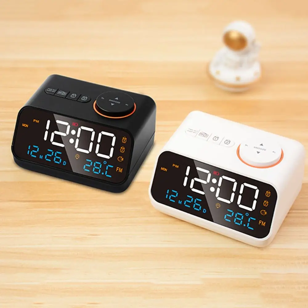 

Adjustable Volume FM Radio LED Alarm Clock Thermometer Hygrometer Digital Table Calendar Connectable Earphones Memory Function