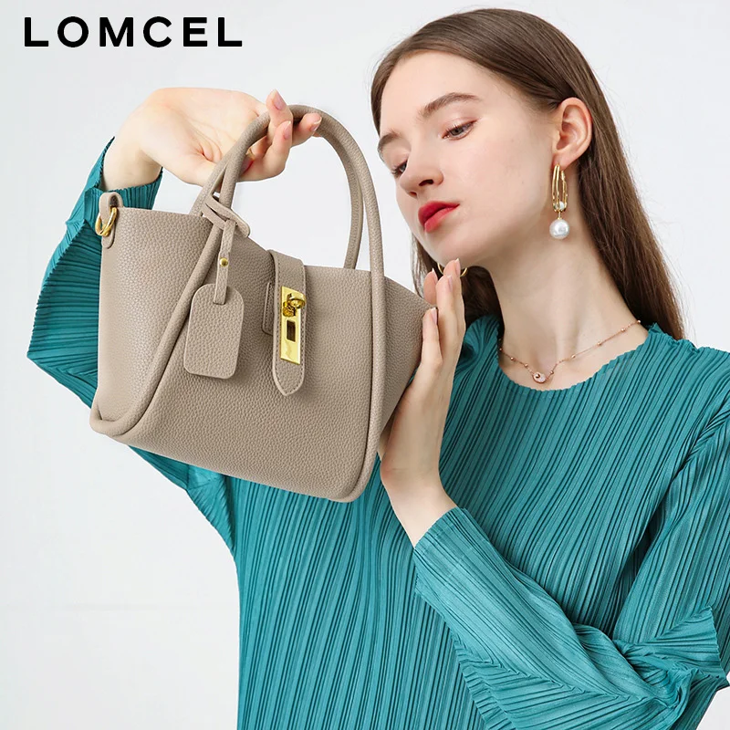 LOMCEL 122 This year, the new style of vegetable basket handbag made of genuine leather is very popular. It is a women's bucket