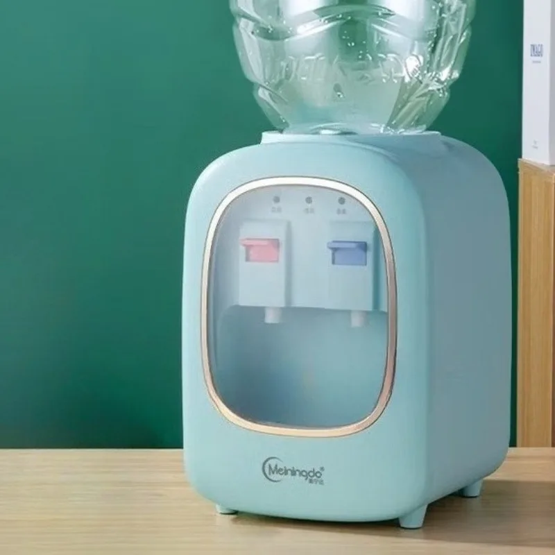 Mini countertop water dispenser for home use, hot and cold water, suitable for offices and dormitories.