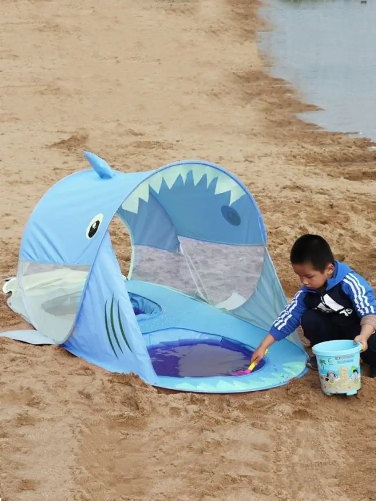 Children's pools, sand digging and water playing tents, sharks and whales, single and double sunshade at the seaside.