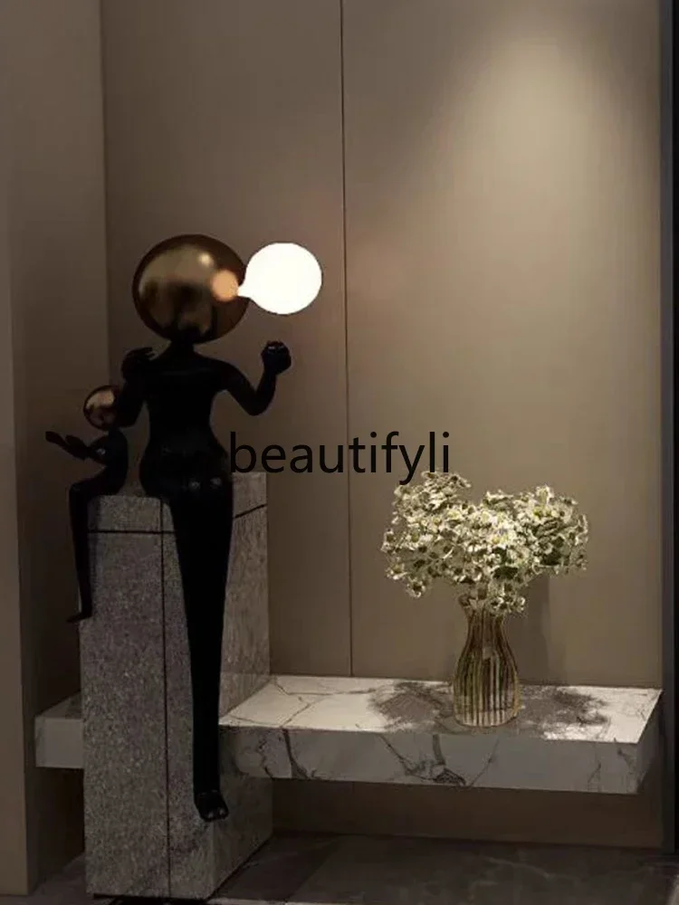 

Light luxury living room sofa abstract character designer creative vertical ornament lamp
