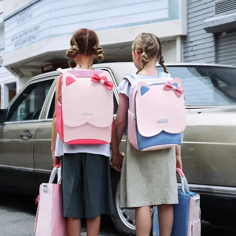 Mochilas escolares de gran capacidad para estudiantes de primaria, protección de la columna vertebral, hombros, impermeables