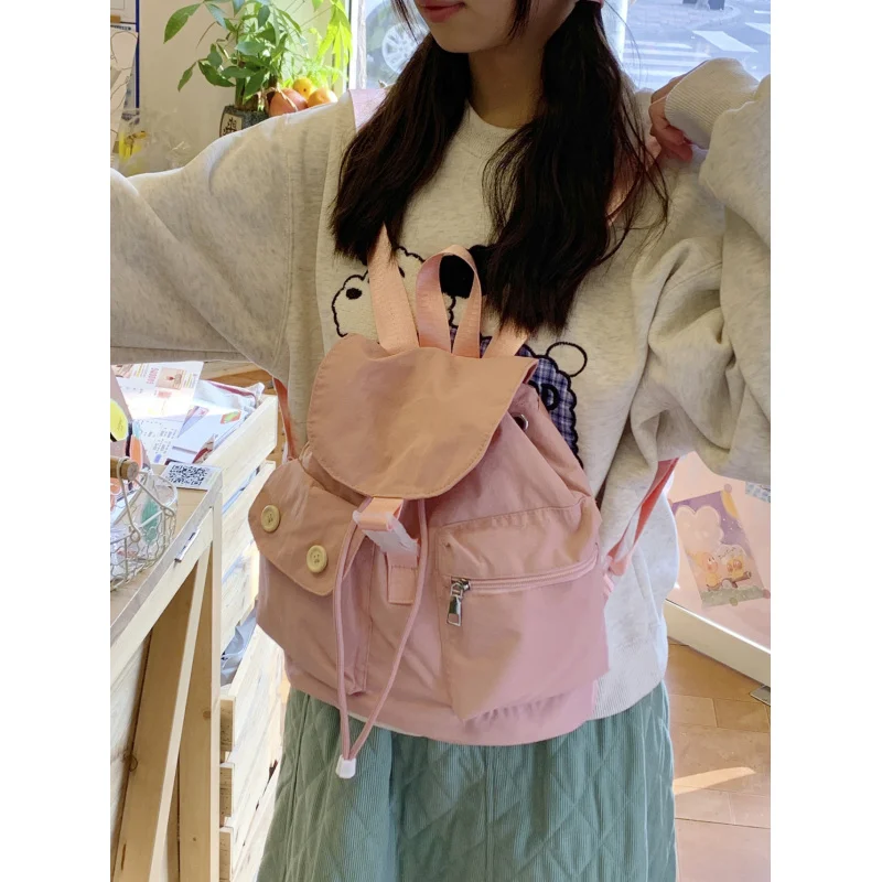 Korean-style niche design pocket button backpack, college-style versatile student schoolbag, casual travel nylon backpack