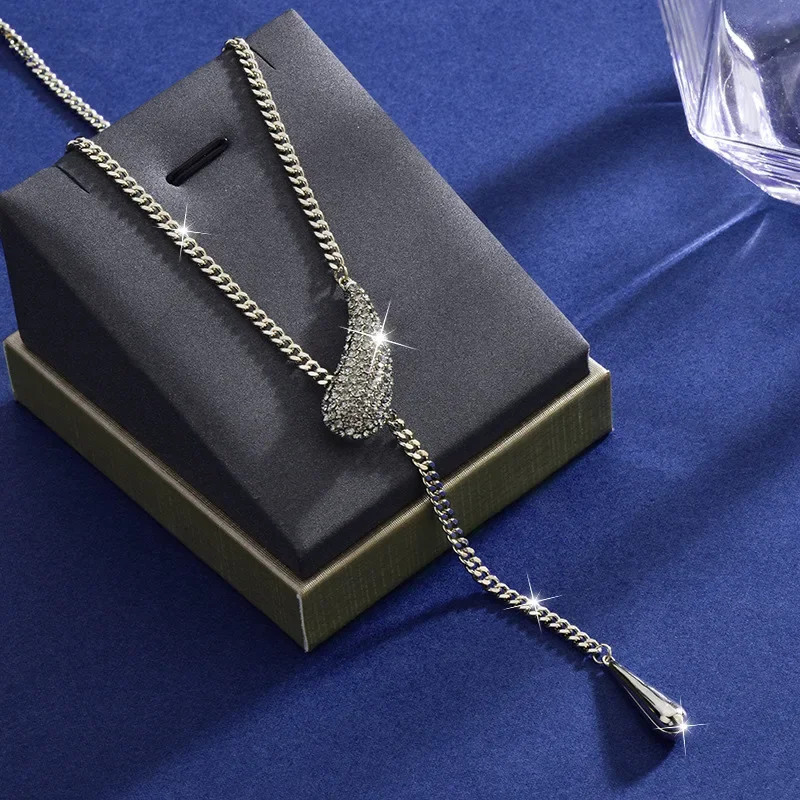 

Teardrop tassel sweater chain, teardrop titanium steel necklace, a light luxury necklace for women
