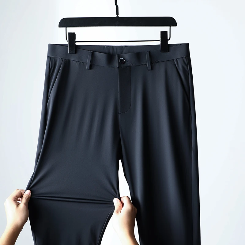 Pantaloni Casual da lavoro in seta di ghiaccio pantaloni estivi da uomo sottili elasticizzati pantaloni da lavoro traspiranti dritti larghi per giovani