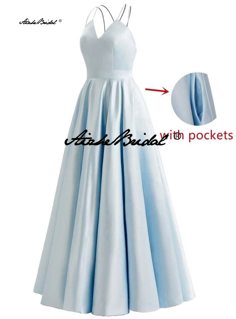 فستان سهرة كلاسيكي بسيط على شكل حرف A بطول الأرض وحزام سباغيتي للحفلات الراقصة مع جيوب تنورة زفاف