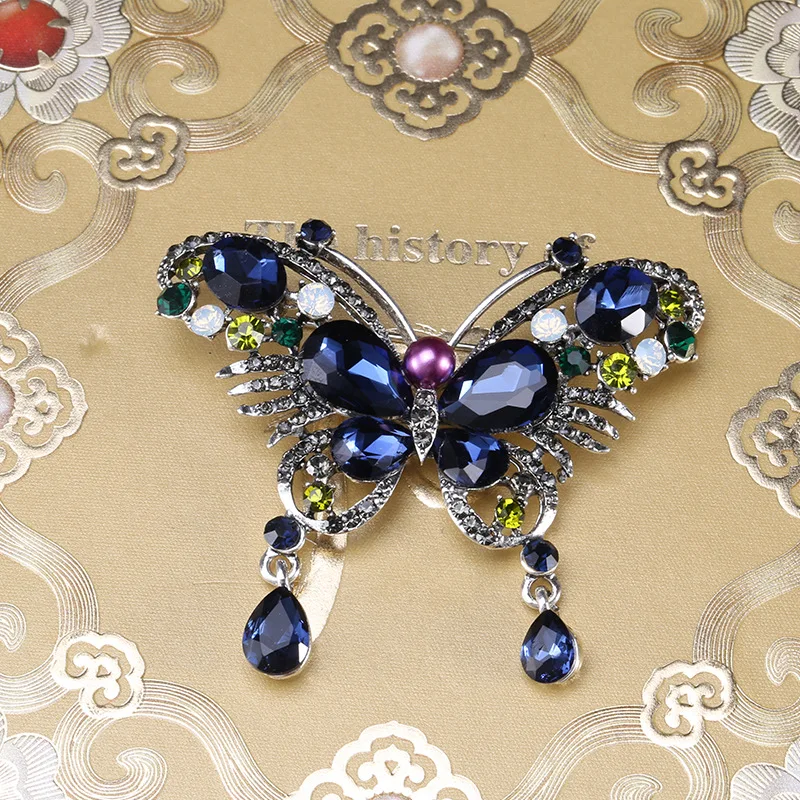 Stylish Butterfly Brooch Pin with Blue Rhinestone Wings, Perfect for Dressing Up and Casual Wear