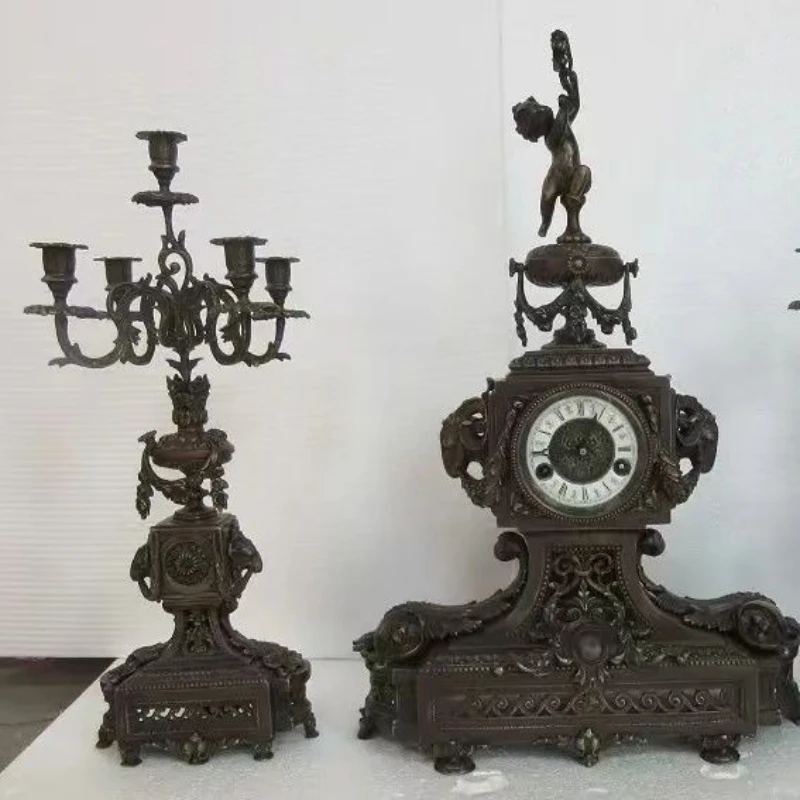 

Clock European copper cast carved seat clock plus candlestick complete set of mechanical timekeeping table clock