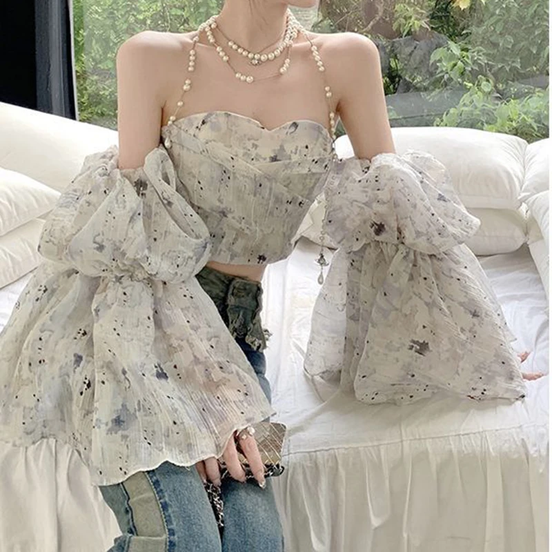 

Fragmented flower one shoulder short shirt for women,high-end,elegant. Pure desire flared sleeves, trendy top