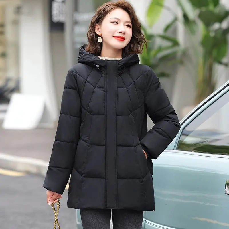 Cappotto moda con cappuccio imbottito in tinta unita con tasca grande autunno nuovo Cappotto imbottito in cotone leggero lungo Joker da donna taglie forti