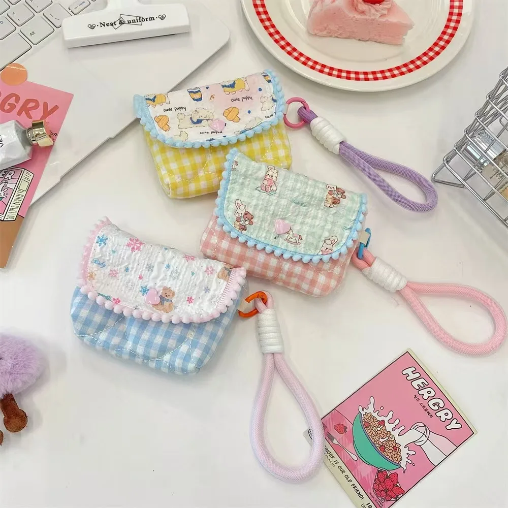 Cartoon-stitched portable and compact travel storage bag