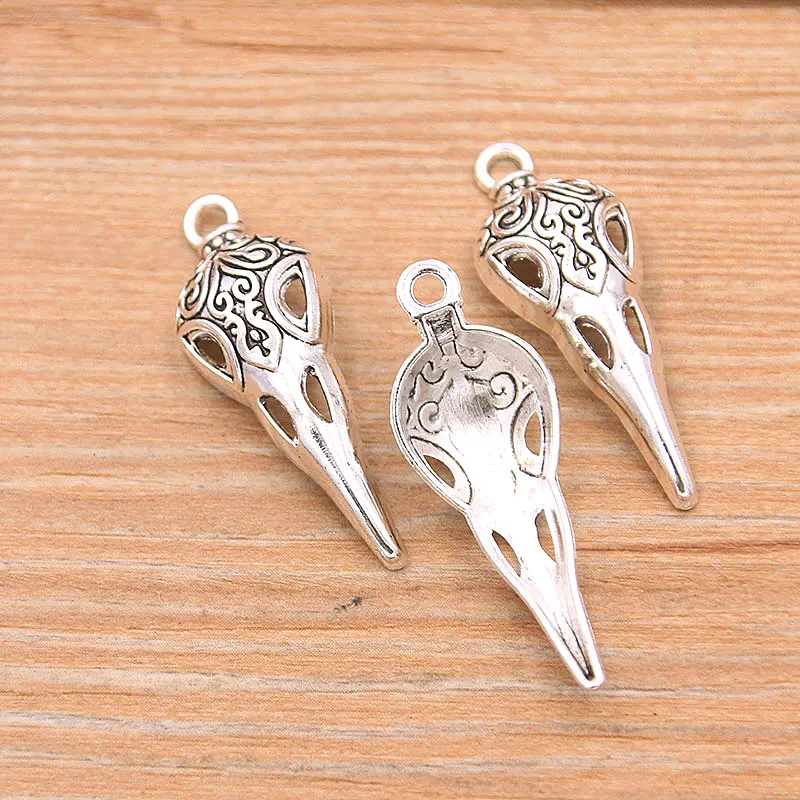 15PCS 12*34mm Picture Color Hollow Skull Beak Charms Animal Pendant Metal Alloy DIY Necklace Bracelet Earrings Marking