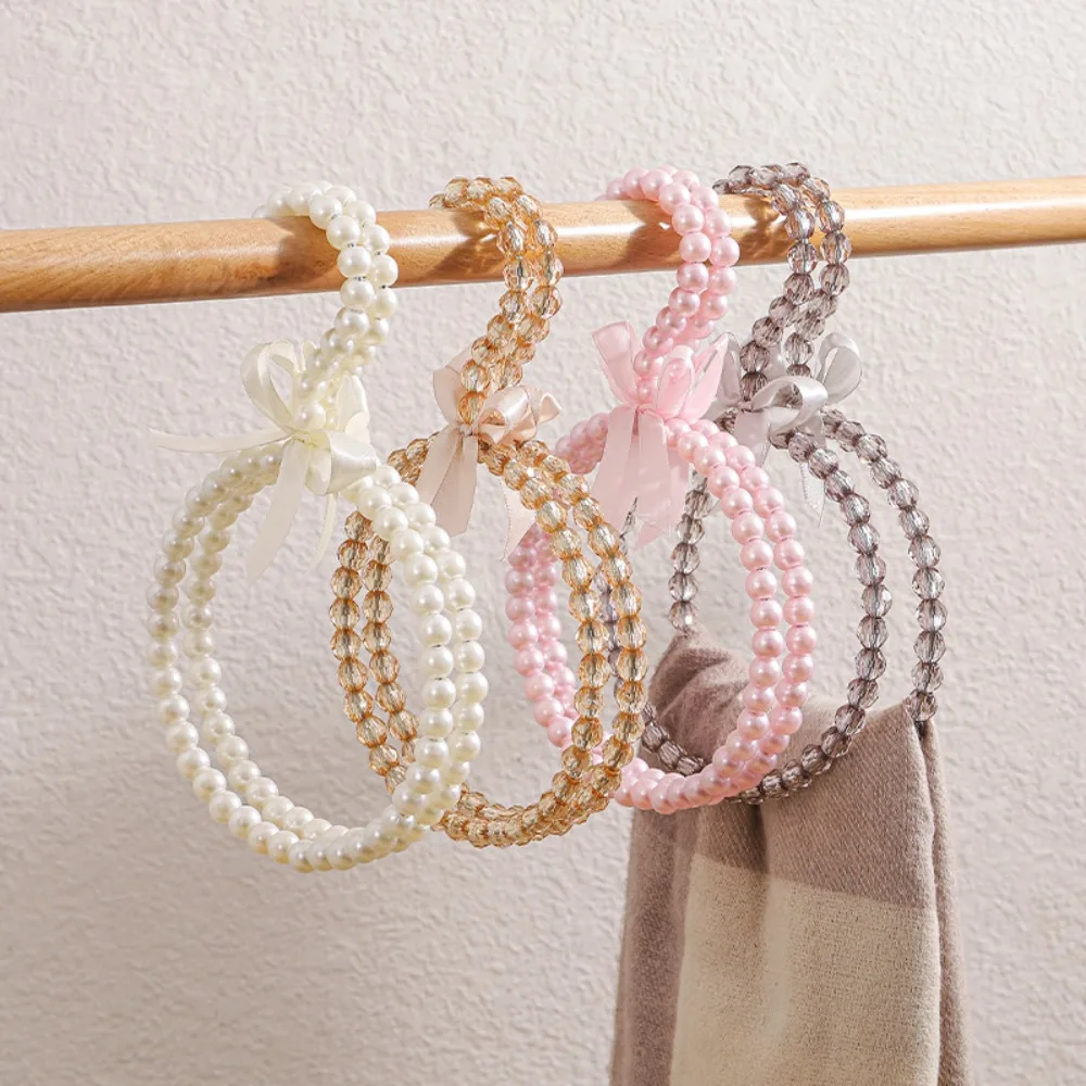 

Decorative Imitation Pearl Beaded Bow Clothes Hanger Space Saving Round Shape Dress Hanger Solid Color Bag Belts Rack Home