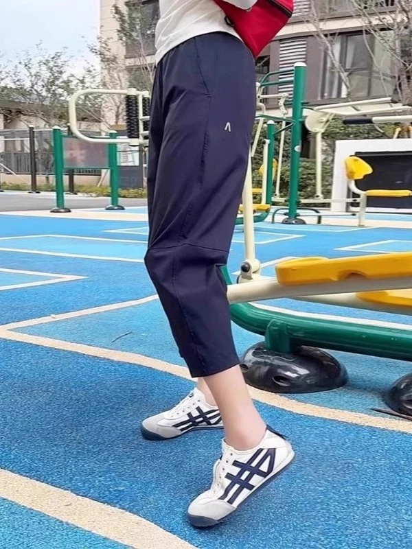 Damskie spodnie sportowe z jedwabiu lodowego Qui Dry, wysoki stan, wyszczuplające, luźny krój, cienkie spodnie typu harlan/marynarka na lato 2025, długość 7/8.