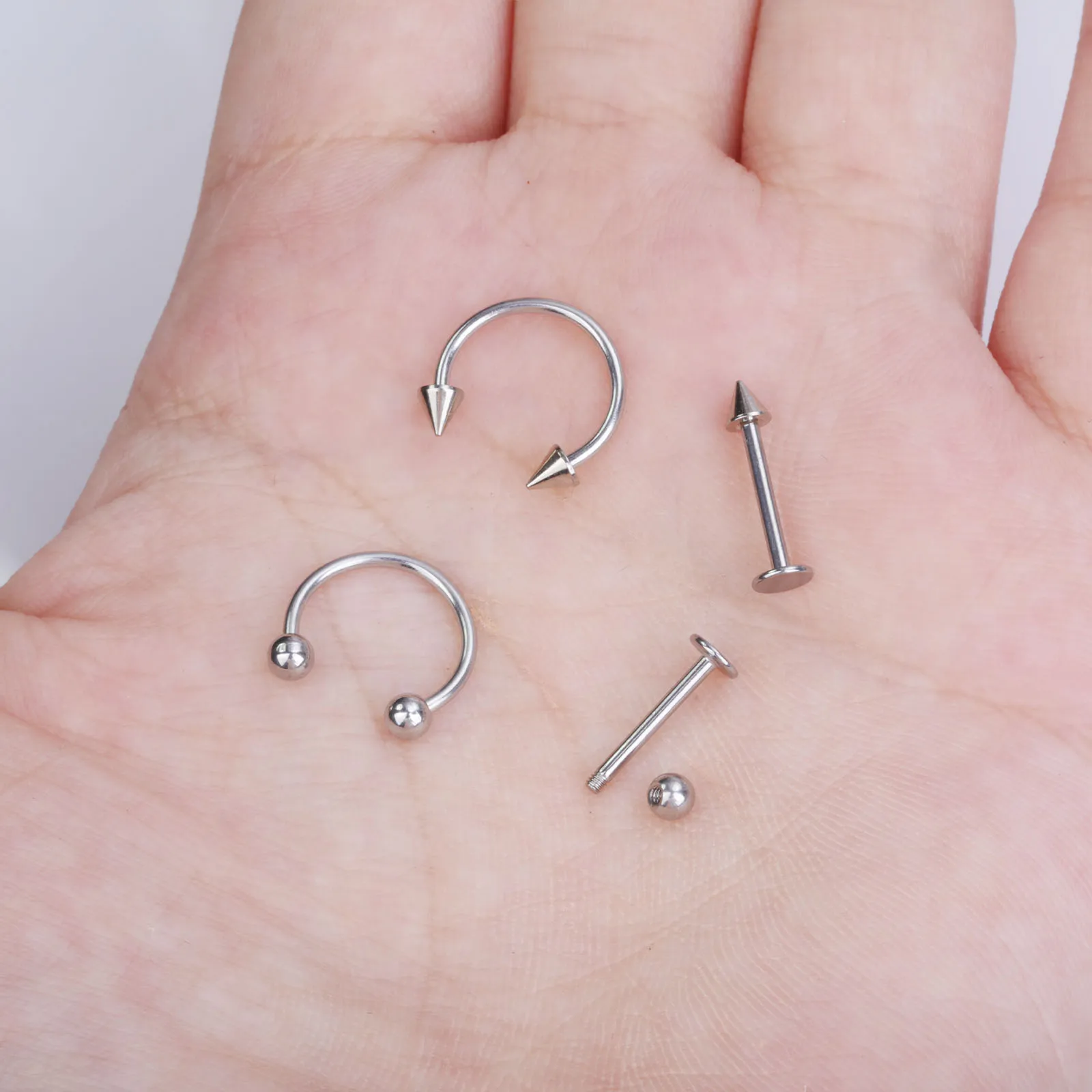 32 قطعة من حلقات الشفاه الفولاذية الجراحية مجوهرات Labret - ثقب دغة مونرو والأفعى، 16 جرام ترصيع اللولب/الديث/الزنمة للنساء والرجال