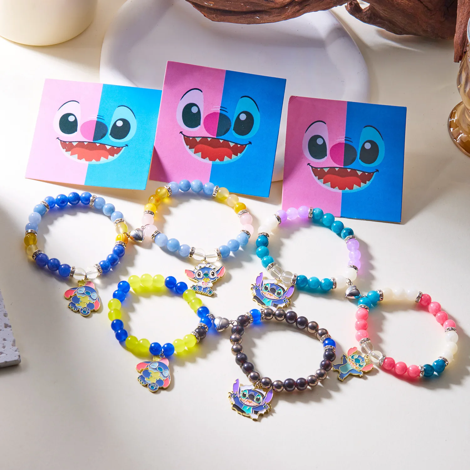 Nuevo conjunto de pulsera con dijes de Lilo y Stitch de Disney, figura de dibujos animados, pulsera de cadena con cuerda magnética de amor, juguetes de regalo de cumpleaños para parejas