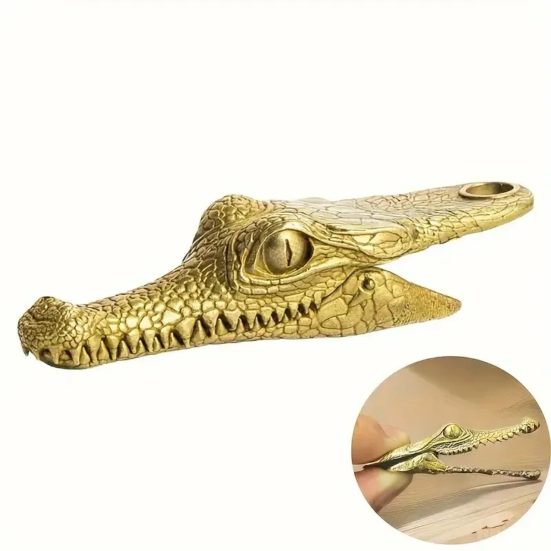 

Golden crocodile keychain. Trendy streetwear with intricate textured design. Ideal gift for partners & dads.
