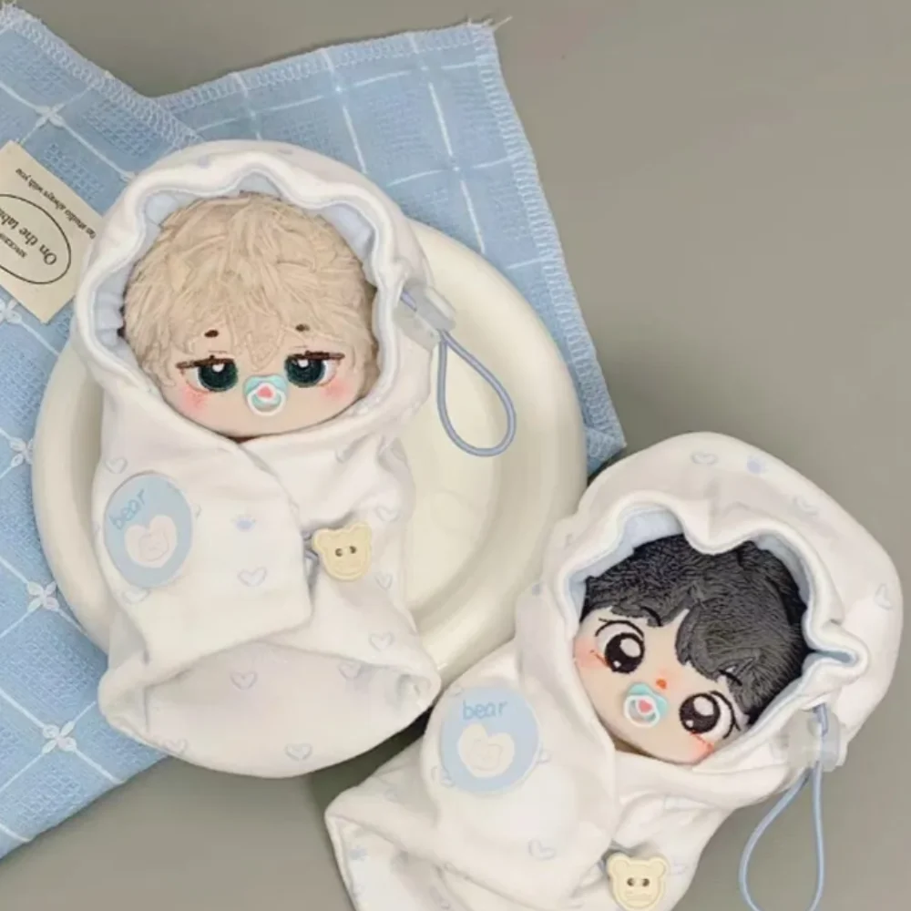 Swaddling 10 ซม.ผ้าฝ้ายตุ๊กตา Swaddling เสื้อผ้าเสื้อคลุมถุงนอน 10 ซม.ตุ๊กตาเสื้อผ้าตลกน่ารักตุ๊กตาแต่งกายชุด