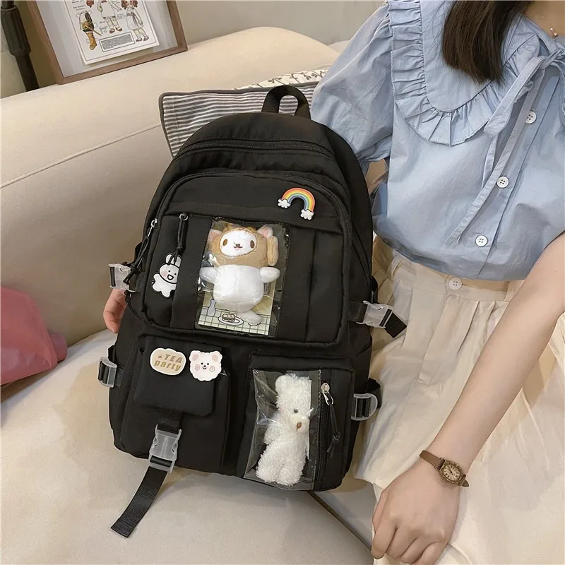 Mochila escolar de nailon con todo colgante para niña, bolso impermeable con bolsillo para estudiante, mochila Kawaii para mujer, paquete de libros para ordenador portátil