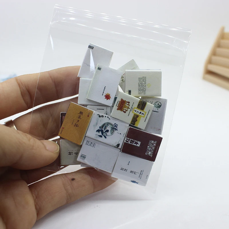 20 unids/set casa de muñecas aleatoria libros en miniatura 1:12 pequeños cómics Mini modelo niños juguetes para juego de imitación accesorios para casa de muñecas