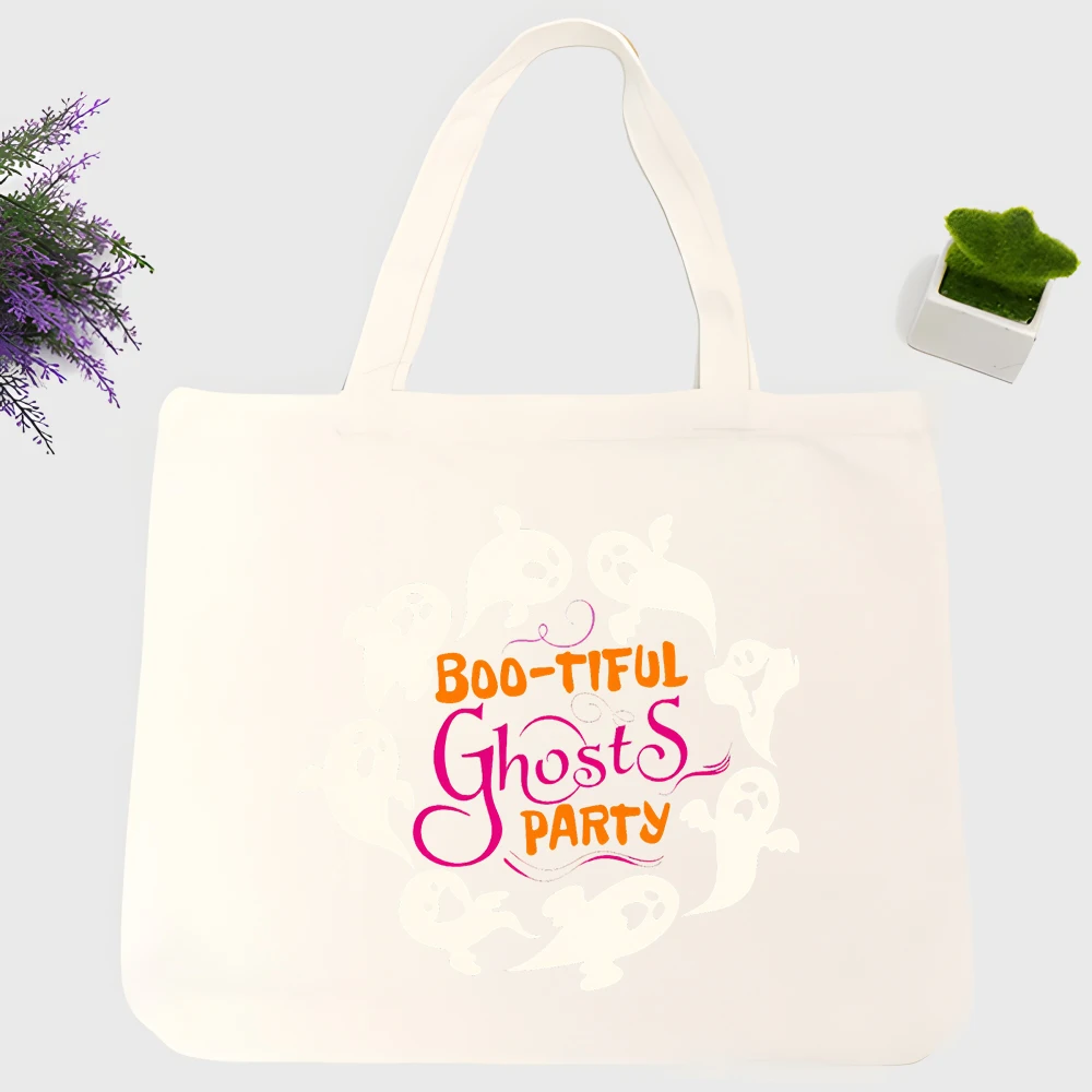 Women's ghost graphic canvas tote bag with letter print, perfect for Halloween parties and casual outings