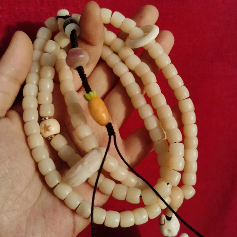 9*8mm , straight-cut 108 beads per bracelet featuring exquisite bone patterns paired with amber and purple hemat