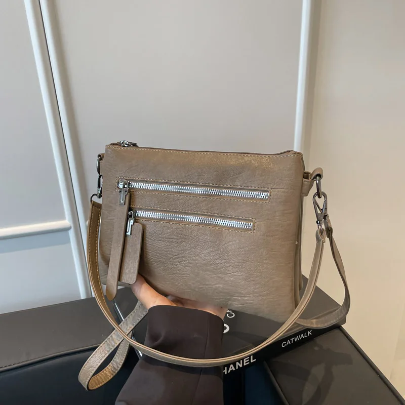 حقيبة يد نسائية جديدة متعددة الجيوب عالية الجودة من جلد البولي يوريثان الناعم حقيبة كتف نسائية فاخرة مصممة للفتيات حقيبة حمل Bolsas Sac