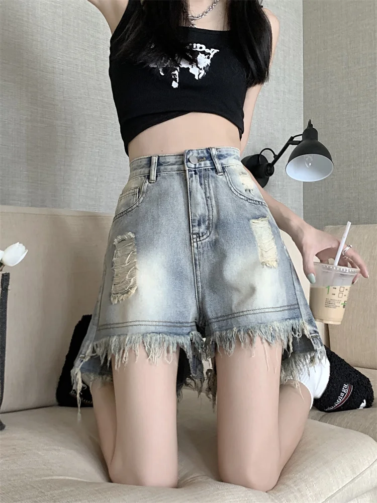 Pantalones vaqueros Retro destridos de cintura alta para mujer, diseño de talla grande con agujero, dobladillo deshilachado, pantalones picantes de cintura alta para primavera y verano