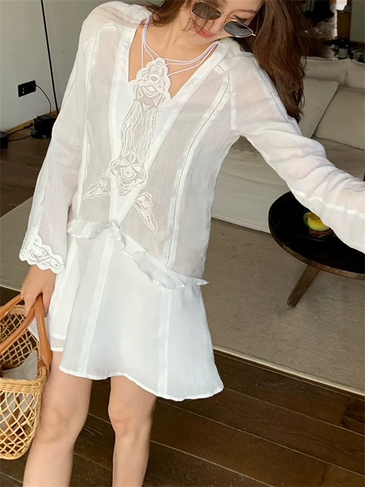 Chemisier fin en ramie blanche pour femme, broderie en dentelle ajourée, légèrement transparent, manches évasées, style pull. 1