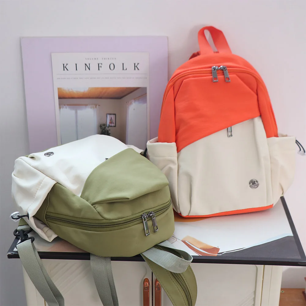 Zaino portatile da donna in stile coreano Zaino leggero per studenti ad alta capacità Borsa a tracolla in nylon nylon per adolescenti
