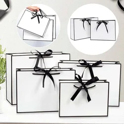 Scatola di carta di cartone portatile bianca creativa scatole di imballaggio per alimenti borsa per il pranzo con sacchetti di regali di nastro nero borsa personalizzata