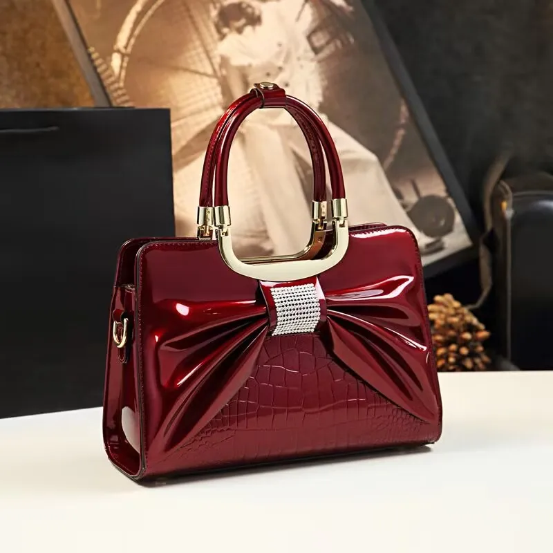 2024 bolsos de noche de cuero brillante de diseñador de lujo para mujer, bolso de hombro tipo bandolera informal para mujer, bolsos con pajarita de diamantes a la moda