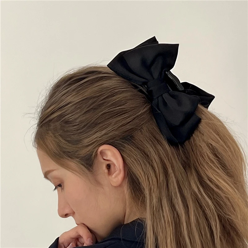 

Black double-sided bow clip shark clip large high-end sense plate hair clip back of the head headdress hair accessories catch