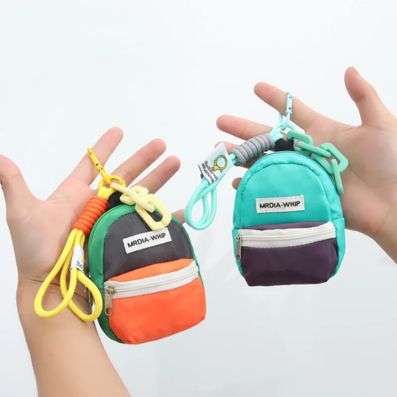 Mini Backpack Key Chain 4 Color,Coin Bag,Coin Purse,Wallets Suitable to Carry Small Items,Lipsticks,Tissues,Cards,Headphone