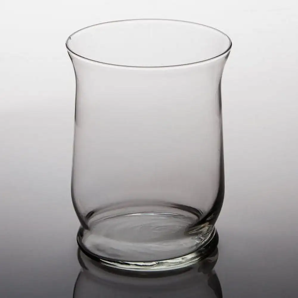 

Adorn Hurricane Vase 6" Set of 4 The wide shape and elegant curves of this lovely glass hurricane vase sturdy base