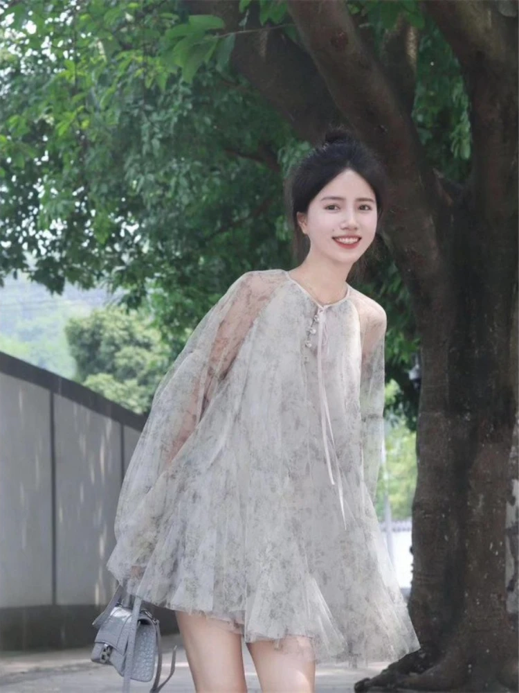 ชุดเดรสสีม่วงสไตล์จีนแบบโปร่งใสหลวมคอกลมแขนยาวมินิเดรสต้นฤดูใบไม้ร่วงชุดเดรสสไตล์นางฟ้าที่ไม่ซ้ำใคร