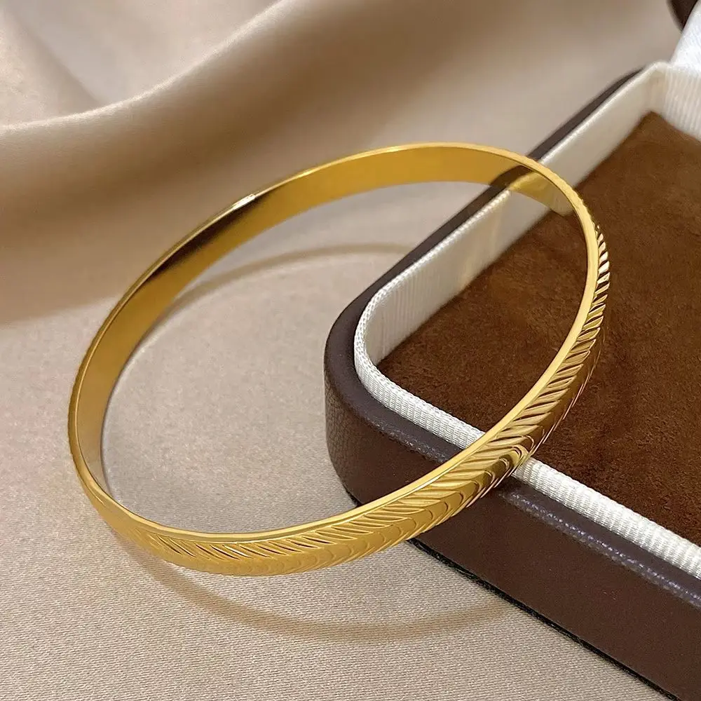 

Minimalist Gold Color Carved Leaf Stainless Steel Bangle Bracelet for Women Fashion Retro Round Open Spring Bangle Jewelry Gift
