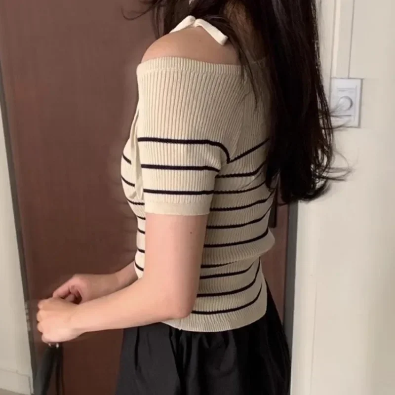 Bandażowa dzianinowa koszulka dla kobiet skośny kołnierzyk koreańska moda szykowna Topa De Mujer wiosna lato eleganckie krótkie koszulki