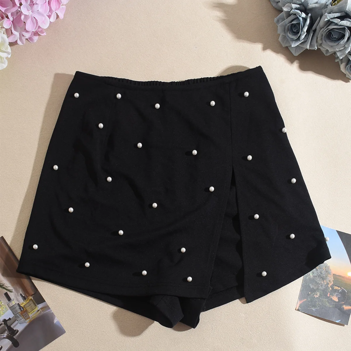 خريف جديد شخصية مطاطا الخرز كولوتيس النساء عالية الخصر السراويل السوداء التنانير