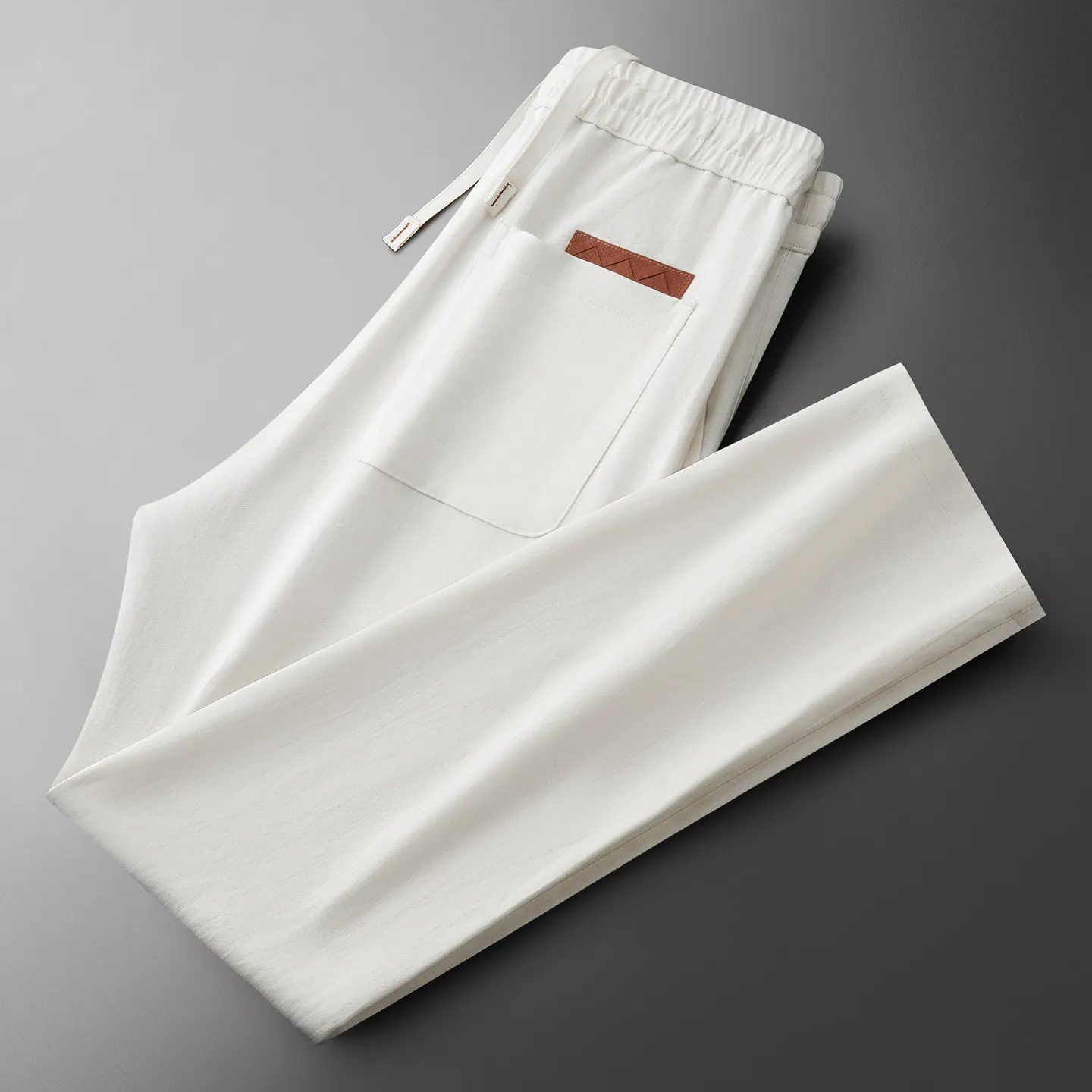 Summer high-end loose casual linen-cotton pants woven with leather label for men, straight-leg casual pants