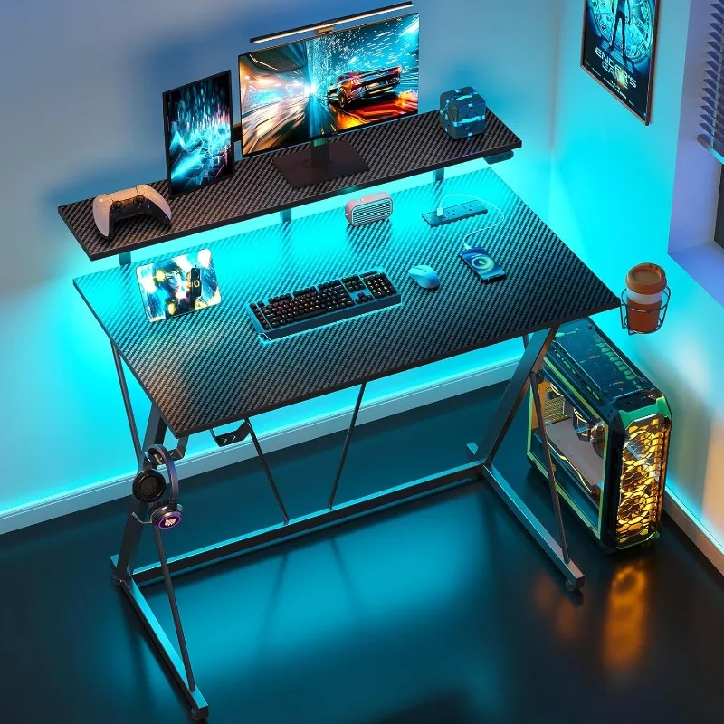 

SEVEN WARRIOR Ergonomic Gaming Computer Desk with LED Lights Power Outlets Monitor Shelf Cup Holder and Headphone Hook