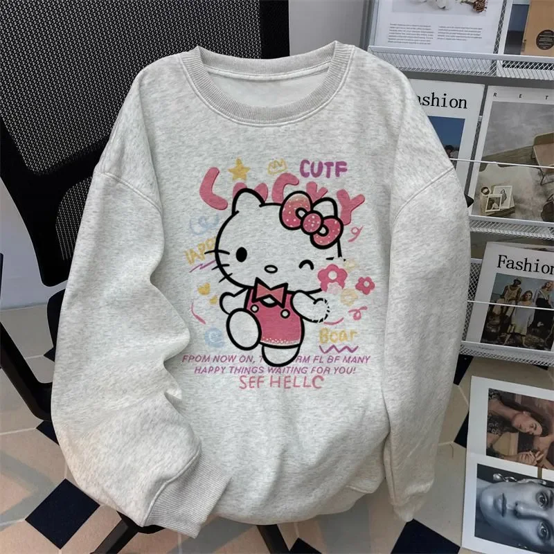 เสื้อสเวตเชิ้ตผู้หญิงลายซานริโอ้ เฮลโล คิตตี้ น่ารัก สไตล์การ์ตูน สำหรับนักเรียน ฤดูใบไม้ร่วง แขนยาว คอกลม เสื้อแฟชั่น เสื้อผ้าผู้หญิง เสื้อนอก