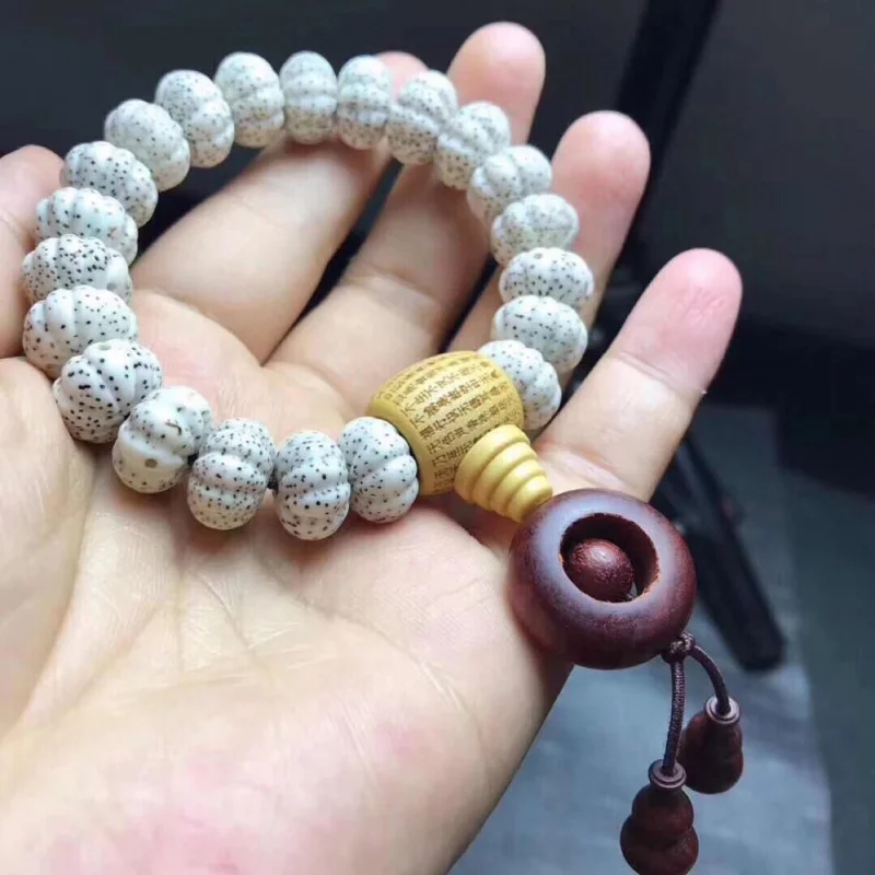 Natural high-polish 12mm pumpkin beads star-moon bracelet paired with a boxwood heart-sutra connector and a rosewood fortune rin